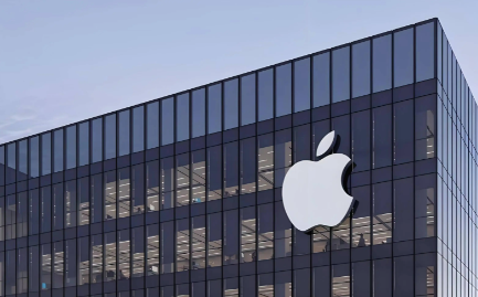 Apple headquarters building with a prominent glass facade and the iconic Apple logo, reflecting modern architecture and innovative corporate culture.