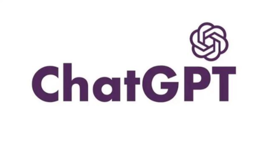 The image displays the ChatGPT logo, featuring the word 'ChatGPT' in bold, purple letters accompanied by the distinctive OpenAI emblem in the top right corner. The design is clean and modern, reflecting the innovative and conversational nature of the AI platform.